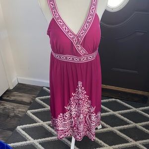 Dress, color is pink, been worn once but in good shape.